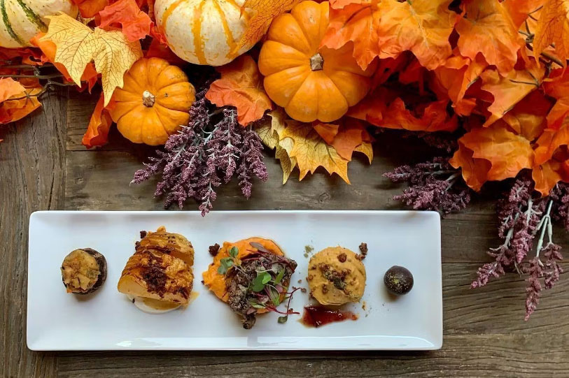 A plate with fall themed small bites.